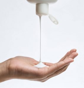 Liquid soap pouring into hand, Colonial Chemical, Inc., US Chemical Manufacturers